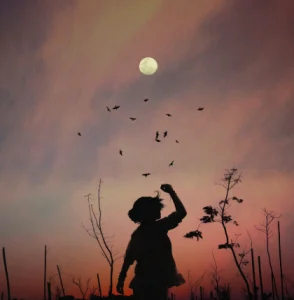 The Complete List of Moon Names: Meanings, Origins & Monthly Full Moons
Silhouette of a person basking under a full moon